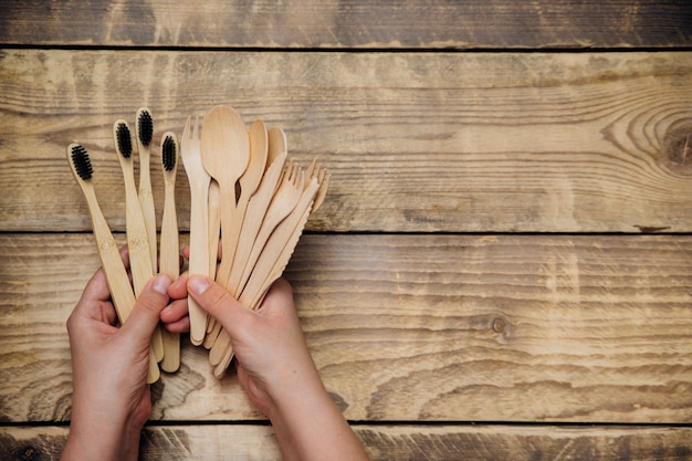 hands holding cooking utensils